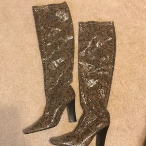 Over the knee snakeskin boots